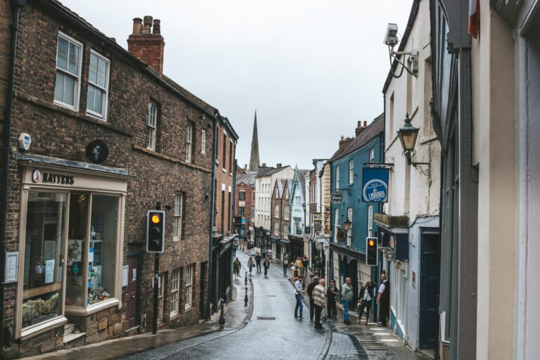 High street lined with shops affected by the 2026 Budget Update Business Rates changes.